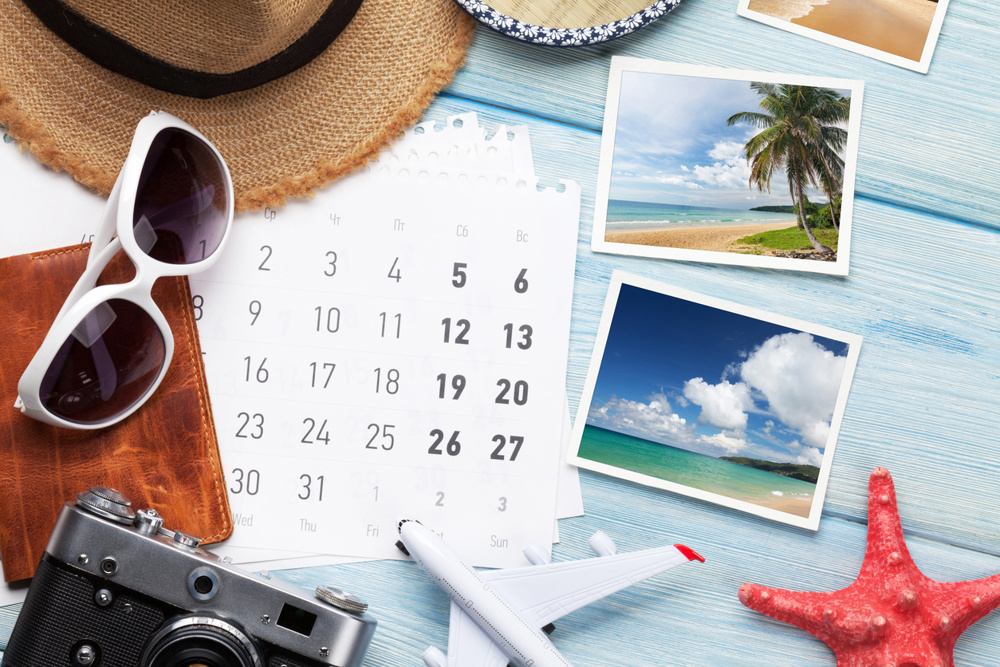 Travel vacation background concept with sun hat, camera, passport, airplane toy and weekend photos on wooden backdrop. Top view. Flat lay. All photos taken by me