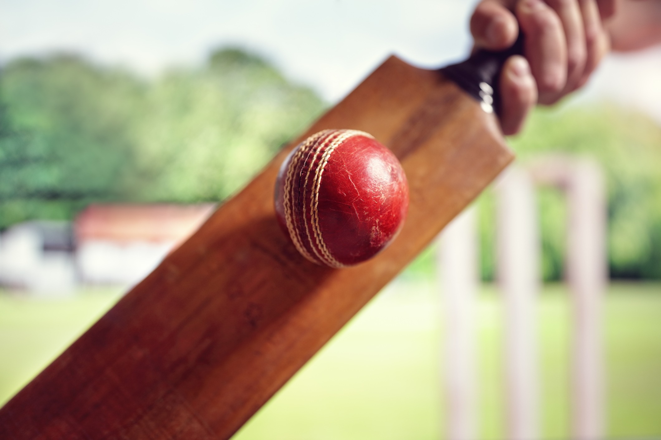 cricket-player-hitting-ball