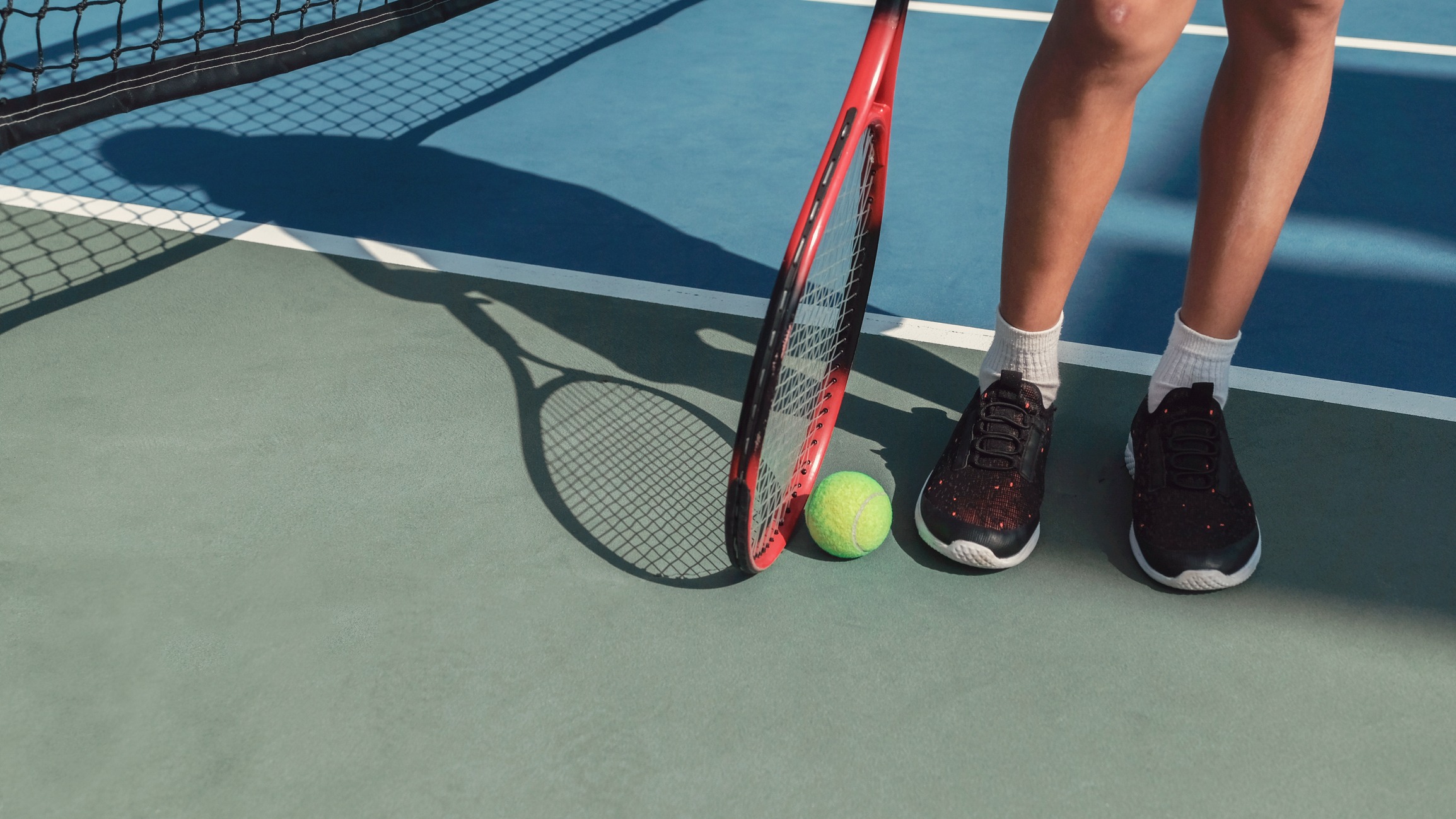 young-tween-preteen-boy-feet-with-green-tennis-ball-and-red-racket-kid-sports-active